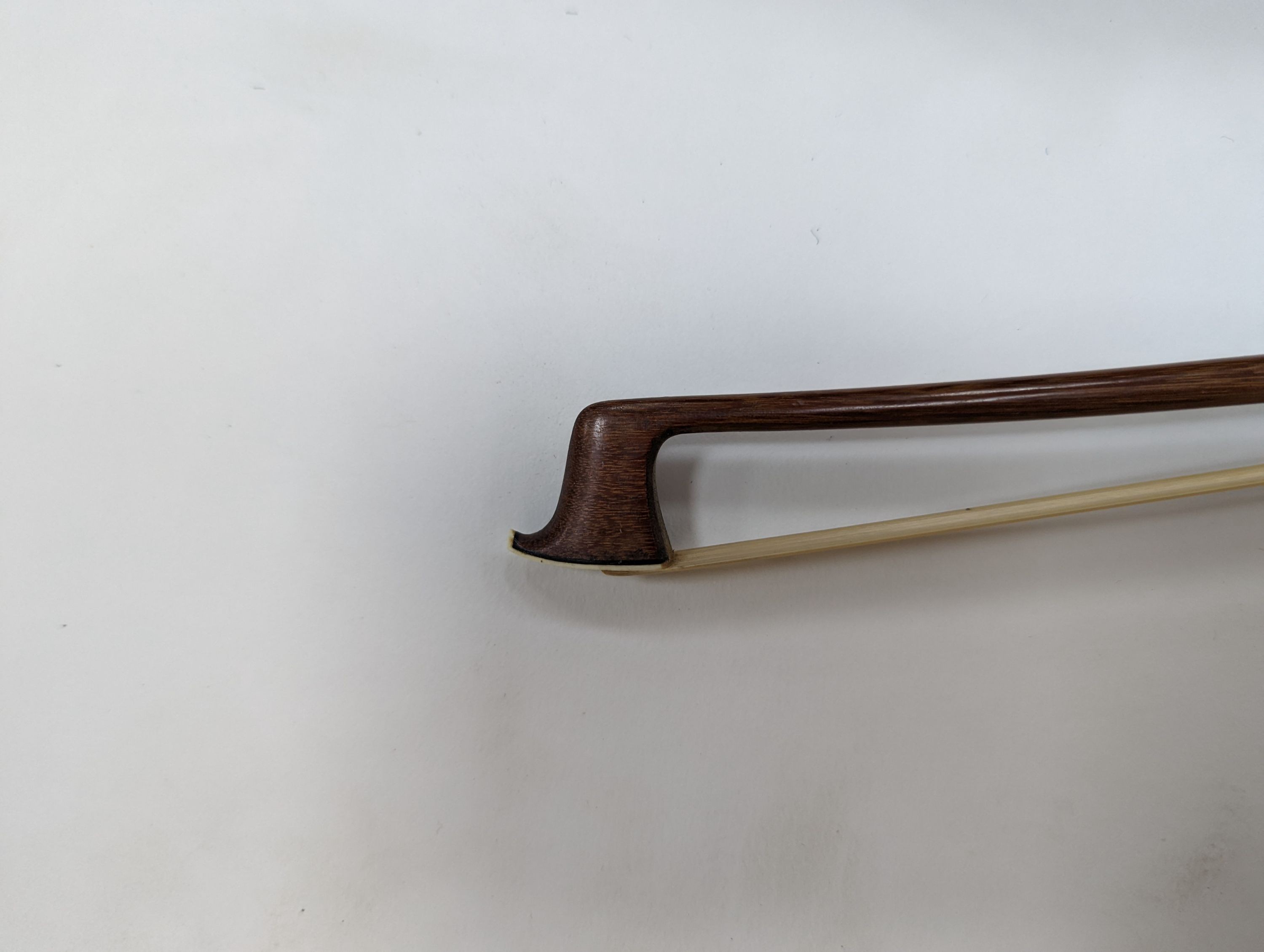 Two cased violins and bows, one with ‘Antonius Straduarius Cremonensis Faciebat Anno 17/13 Made In Czechoslovakia’ label to interior